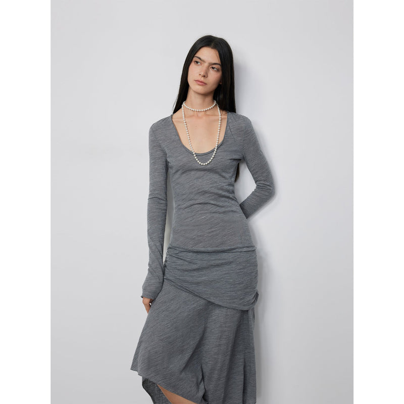 Model in the Dreamy Ball Wool Dress by PremiumStyle Co.,Limited, styled in dark gray with an eye-catching asymmetric hem. This chic women's dress redefines women's fashion by combining elegance and comfort in the Asymmetric Hem Wool Dress.