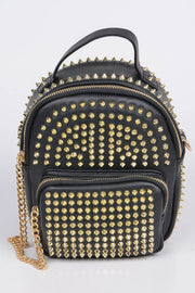 A stylish Studded Backpack with Chain Zipper by HD ACCESSORIES featuring bold gold studs on a black background, emphasizing its edgy accessories design. This new arrival makes a perfect handbag choice for those seeking a standout piece.