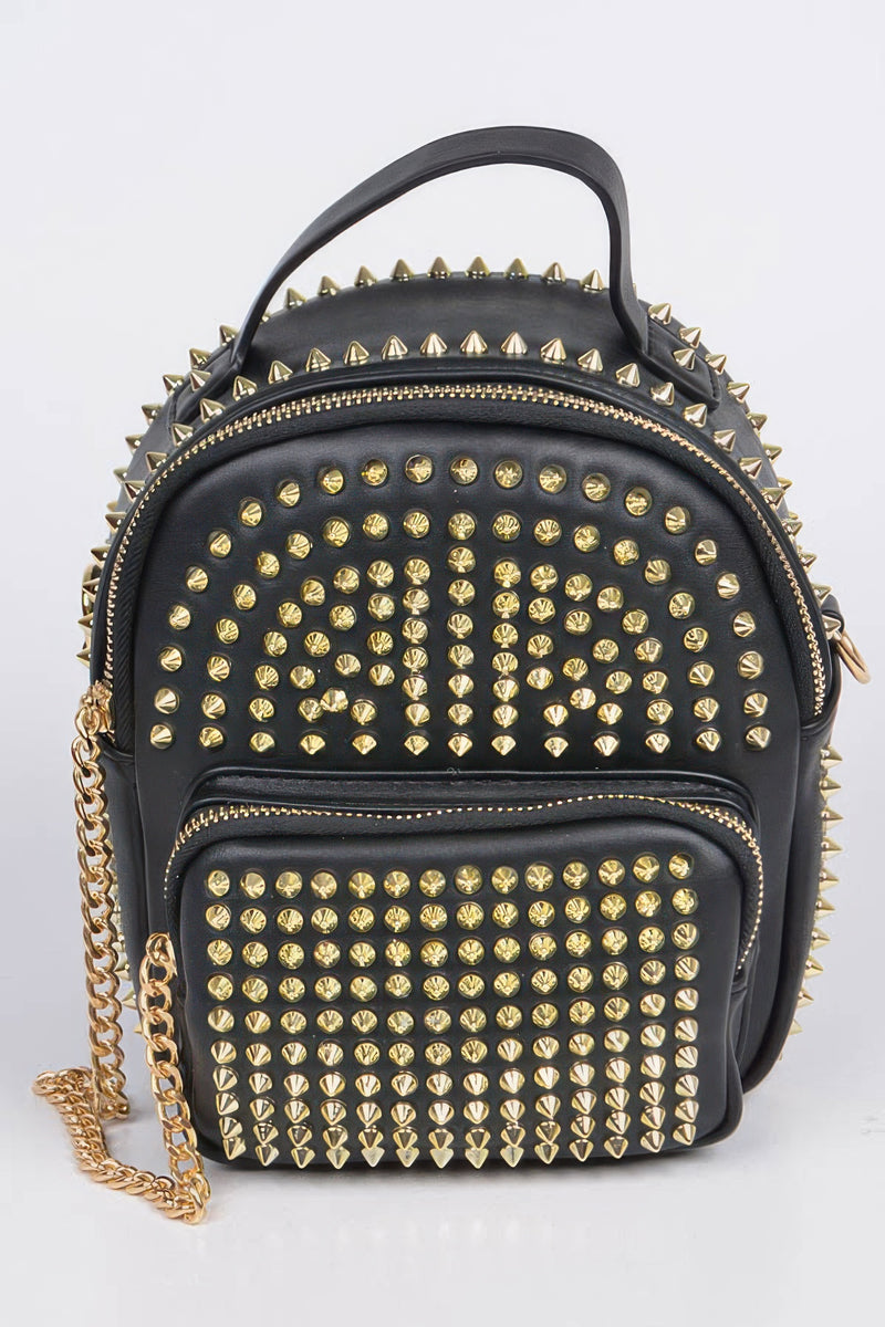 A stylish Studded Backpack with Chain Zipper by HD ACCESSORIES featuring bold gold studs on a black background, emphasizing its edgy accessories design. This new arrival makes a perfect handbag choice for those seeking a standout piece.