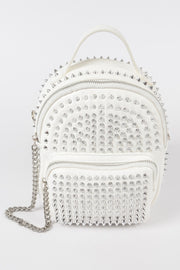 The Studded Backpack with Chain Zipper by HD ACCESSORIES in white and silver, showcasing its elegant studded design. This handbag is part of the new arrivals and offers a chic option for accessories lovers looking for versatility.