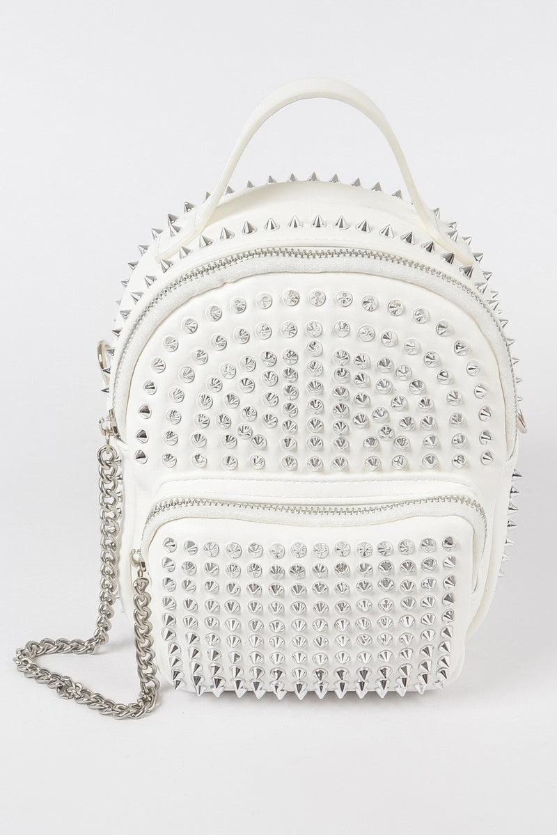 The Studded Backpack with Chain Zipper by HD ACCESSORIES in white and silver, showcasing its elegant studded design. This handbag is part of the new arrivals and offers a chic option for accessories lovers looking for versatility.