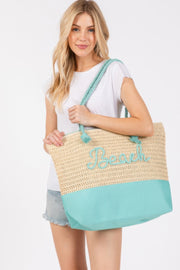 The Rope Handle Beach Tote in Turquoise from HD ACCESSORIES is demonstrated by a smiling model, showcasing its spacious and stylish design perfect for beach trips or city strolls. This eye-catching Beach Tote Bag complements any outfit and comes in multiple colors including Orange and Coral, making it a must-have accessory.