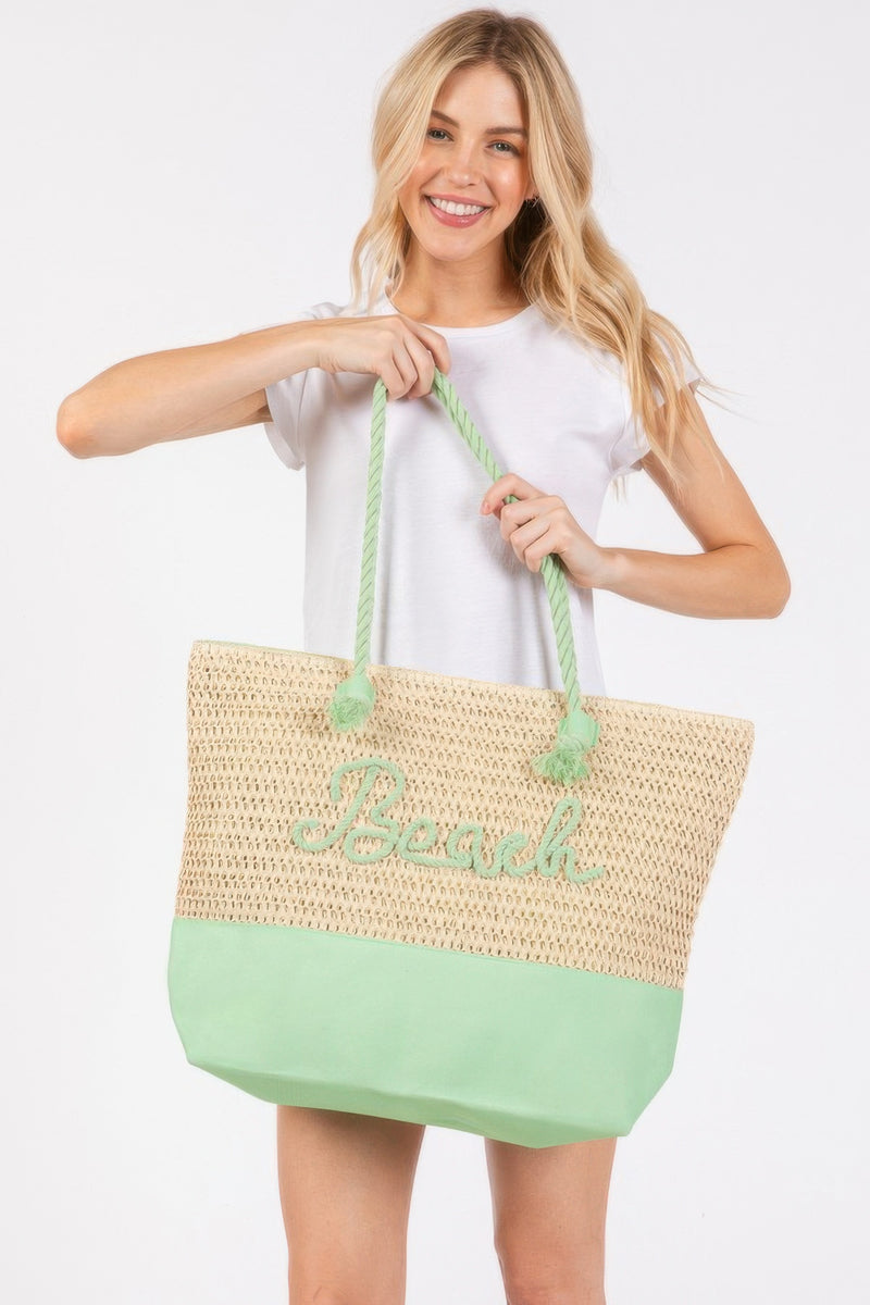 The Rope Handle Beach Tote by HD ACCESSORIES presented in a vibrant Green color with crochet fabric and beach-inspired lettering. This Beach Tote Bag combines style and functionality, suitable for vacations and casual errands. Explore more in the collection featuring numerous color options like Coral and Yellow under the HANDBAGS category.