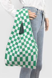 Model showcasing a green and white checker pattern Japanese Knot Bag — Chic Checker Woven by HD ACCESSORIES. This bag captures the essence of the Japanese Knot Bag Style with its trendy design, offering a stylish flair for casual and chic outfits. ACCESSORIES, Bag, Green, CCPRODUCTS, Chic Checker Poly Woven, HANDBAGS, NEW ARRIVALS.