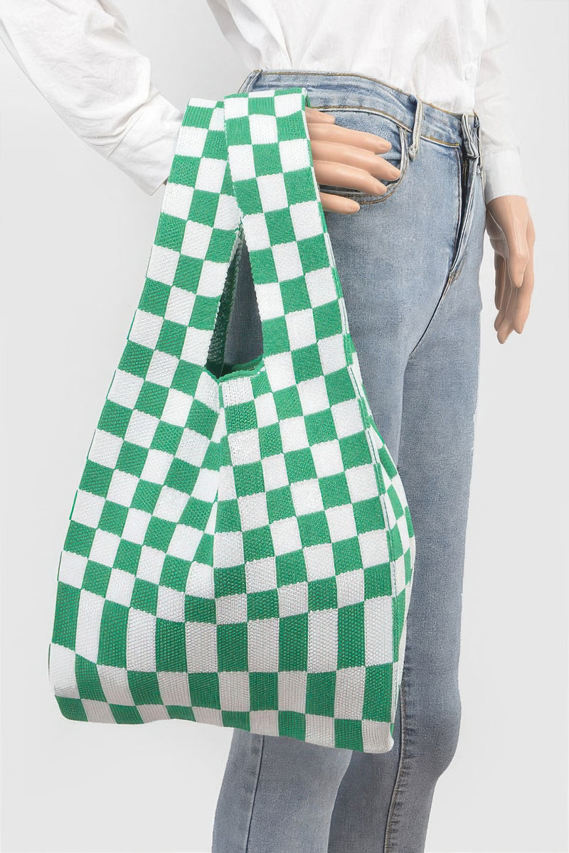 Model showcasing a green and white checker pattern Japanese Knot Bag — Chic Checker Woven by HD ACCESSORIES. This bag captures the essence of the Japanese Knot Bag Style with its trendy design, offering a stylish flair for casual and chic outfits. ACCESSORIES, Bag, Green, CCPRODUCTS, Chic Checker Poly Woven, HANDBAGS, NEW ARRIVALS.