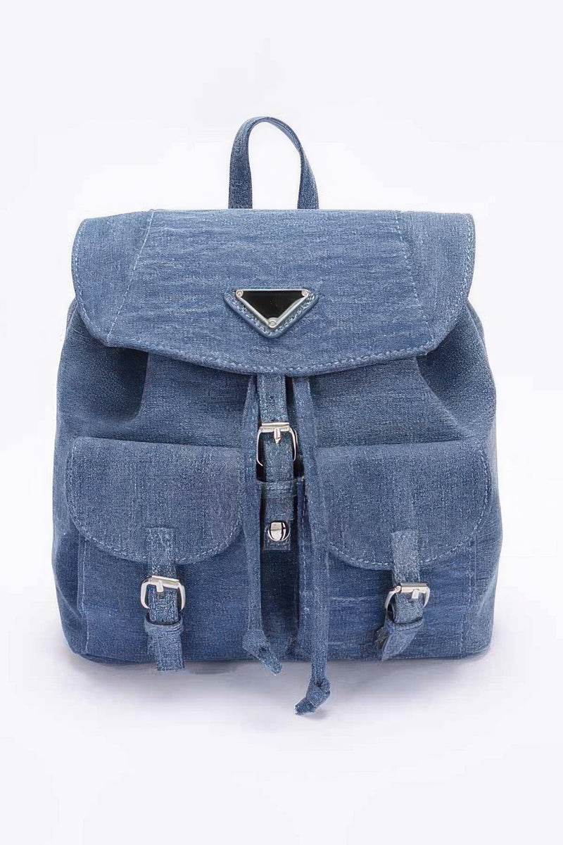 Front view of the medium blue denim double pocket front backpack by HD ACCESSORIES, blending trendy style with practicality. This Backpack features double front pockets and is a stylish addition to any outfit, making it an essential accessory from our collection of NEW ARRIVALS.