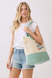 Model holding the Beach Tote Bag in Green by HD ACCESSORIES, demonstrating its versatility for casual outings. A fashionable choice for beach lovers. ACCESSORIES, Beach Bum Tote Bag, Beach Tote Bag, Beach Tote Bag in Green, Beach Tote Bag in Green - Beach Bum, CCPRODUCTS, Green, Green Tote Bag, HANDBAGS, NEW ARRIVALS, Tote Bag.