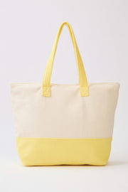 A simple rear view of the Beach Tote Bag in Yellow from HD ACCESSORIES, showcasing its spacious design ideal for everyday use. This handbag is a must-have from the new arrivals.