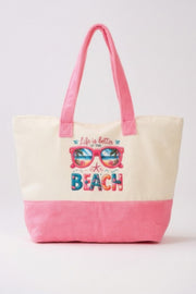 The Life Is Better At The Beach Tote Bag by HD ACCESSORIES features a vibrant design with beach-themed graphics. This roomy tote bag showcases soft terrycloth material in delightful pink, perfect for summer outings. Ideal for anyone looking for stylish accessories, handbags, and new arrivals.
