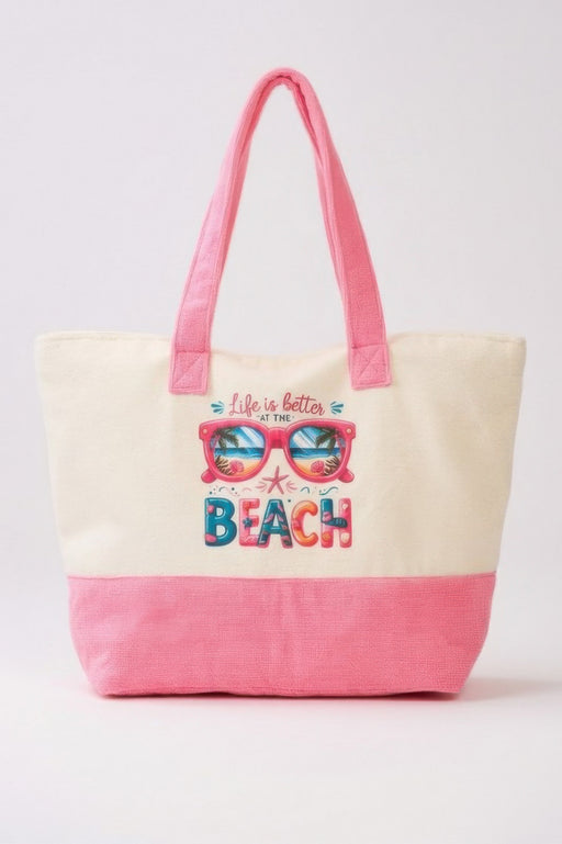 The Life Is Better At The Beach Tote Bag by HD ACCESSORIES features a vibrant design with beach-themed graphics. This roomy tote bag showcases soft terrycloth material in delightful pink, perfect for summer outings. Ideal for anyone looking for stylish accessories, handbags, and new arrivals.