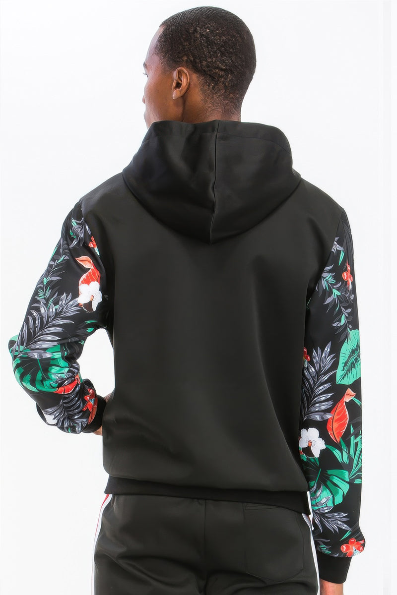 Back view of a male model in the Printed Polyester Track Set for Men by Astral Signature™, highlighting the floral sleeve design. Ideal for those seeking fashionable activewear. Active, Activewear, Black, CCPRODUCTS, MENS, MENS SETS, NEW ARRIVALS, Track Set.