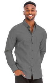 A man wearing a casual gray long sleeve shirt from Astral Signature™, perfect for all-day wear and casual outings. This Long Sleeve Shirt features a classic button-down design and is made with a soft, breathable fabric. Part of the latest styles including CCPRODUCTS, Charcoal, H.Black, MENS, MENS TOPS, and NEW ARRIVALS.