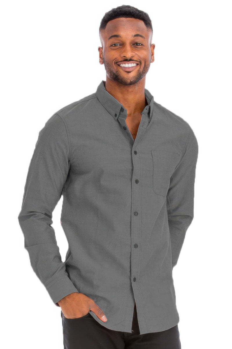 A man wearing a casual gray long sleeve shirt from Astral Signature™, perfect for all-day wear and casual outings. This Long Sleeve Shirt features a classic button-down design and is made with a soft, breathable fabric. Part of the latest styles including CCPRODUCTS, Charcoal, H.Black, MENS, MENS TOPS, and NEW ARRIVALS.