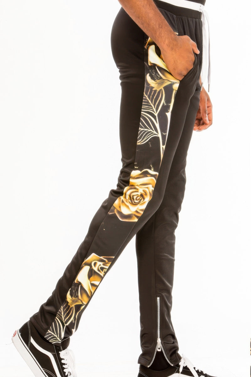 Detailed view of the pants in the Men's Sweat Set - Print Hoodie from Astral Signature, showcasing elegant floral accents and modern ankle zippers. Great for active lifestyles and stylish comfort. Keywords: active, Activewear, CCPRODUCTS, Men's Sweat Set, MENS, MENS SETS, Multi, NEW ARRIVALS, Print Hoodie.