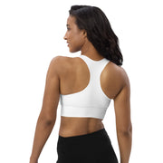 Model showing the back of the Astral Signature Longline Sports Bra, capturing the sleek design for enhanced support during athletic activities.