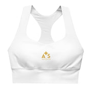 Close-up of the front of the Astral Signature Longline Sports Bra, emphasizing the high-quality fabric and logo, designed for sports and active lifestyles.