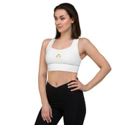 Model in the front view of the Astral Signature Longline Sports Bra, displaying trendy styling and comfort for active lifestyles.