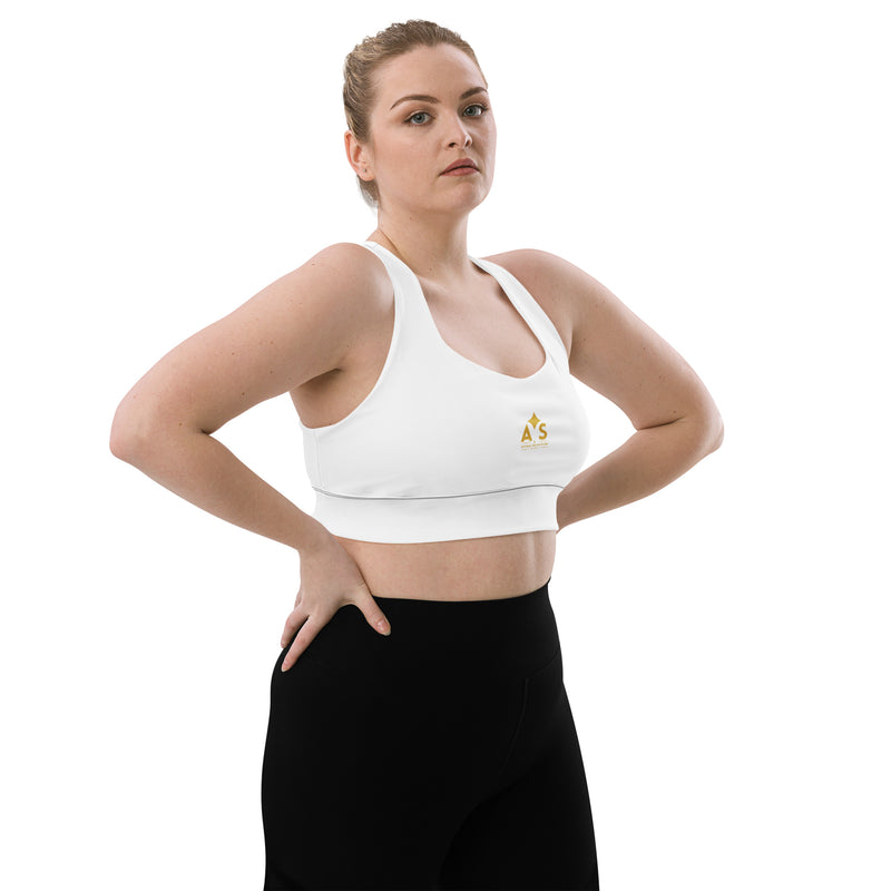 Profile of a model in the Astral Signature Longline Sports Bra, showcasing its comfortable fit suitable for both casual and athletic wear.