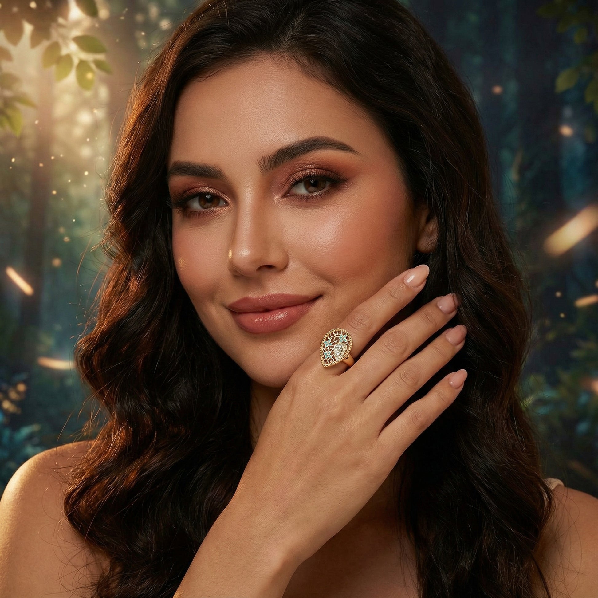 A model elegantly showcasing the Enchanted Heart 18K gold plating Ring by Astral Signature, featuring intricate filigree and turquoise enamel. Ideal for a gift for her, this exquisite piece is part of a limited edition collection. Astral Signature.