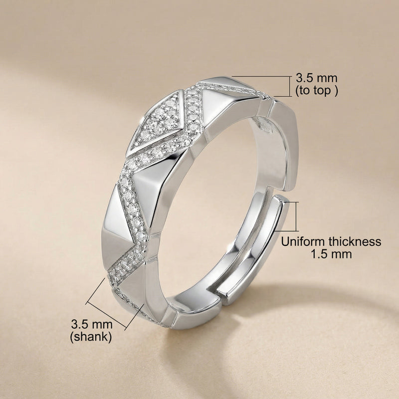 Detailed view of the Geometric Luxe Ring showcasing its architectural facets, made from Eco-Brass with white gold plating and zirconia embellishments, crafted by Astral Signature.