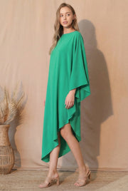 A full view of the TYCHE Matte Crepe One Sleeve Dress in rich green, showcasing its unique design and modern aesthetic perfect for various occasions. The dress belongs to APPAREL, CCPRODUCTS, Dress, DRESSES, Green, Matte Crepe One Sleeve Dress, NEW ARRIVALS, One Sleeve Dress, Women's Clothing.