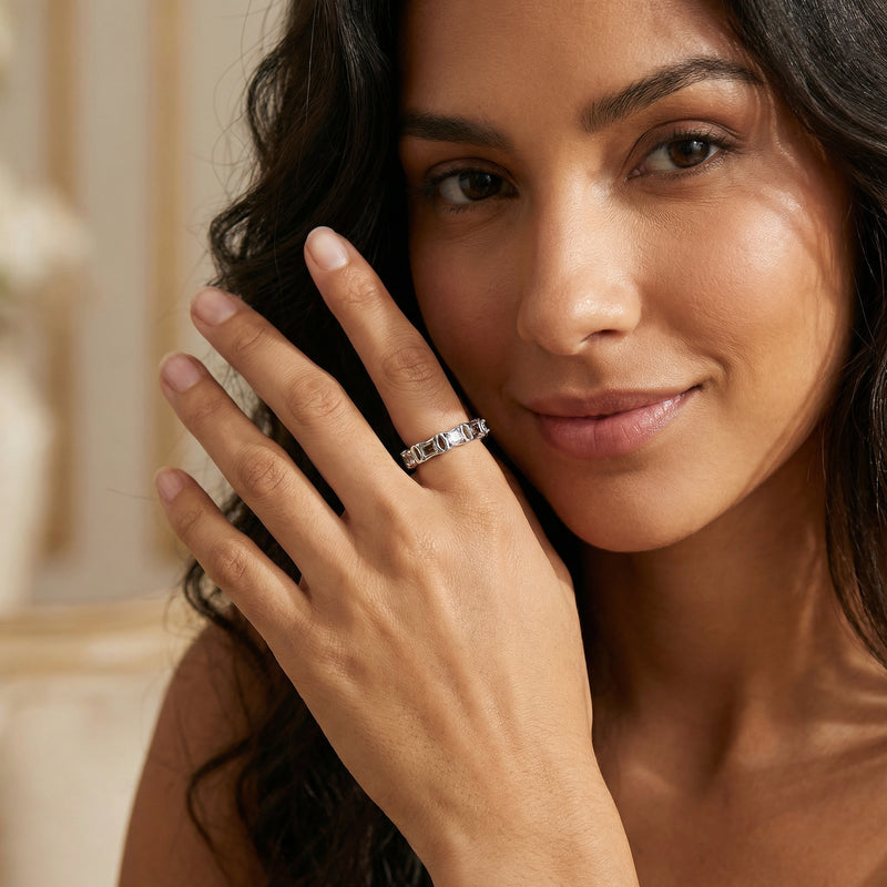 A model wearing the Geometric Luxe Ring by Astral Signature, capturing its elegant Eco-Brass design and stunning zirconia details, perfect for any occasion.