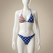 A mannequin displaying the Halter Triangle Bikini Set - American Flag Spirit by BE WICKED, showcasing its triangle top and low-rise bottom design. This Halter Triangle Bikini Set is an eye-catching piece in the APPAREL collection, perfect for summer celebrations and a wonderful Gift for Her. With patriotic red, white, and blue elements, it embodies the American Flag Spirit and is ideal for inclusion in SWIMWEAR & COVER-UPS.