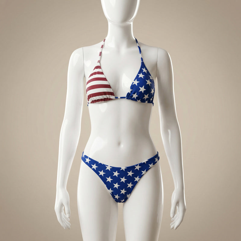 A mannequin displaying the Halter Triangle Bikini Set - American Flag Spirit by BE WICKED, showcasing its triangle top and low-rise bottom design. This Halter Triangle Bikini Set is an eye-catching piece in the APPAREL collection, perfect for summer celebrations and a wonderful Gift for Her. With patriotic red, white, and blue elements, it embodies the American Flag Spirit and is ideal for inclusion in SWIMWEAR & COVER-UPS.