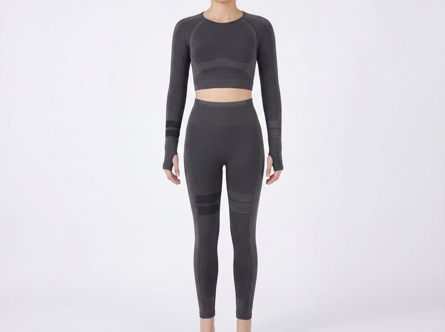 Presentation of the Shadow Flex Yoga Set by CHARMING BUNNY, showcasing a stylish black long-sleeve crop top paired with sleek high-waisted leggings, ideal for yoga and training. A fashionable choice for activewear ensembles. APPAREL, BASICS & ACTIVEWEAR, Black, CCPRODUCTS, NEW ARRIVALS, SETS.
