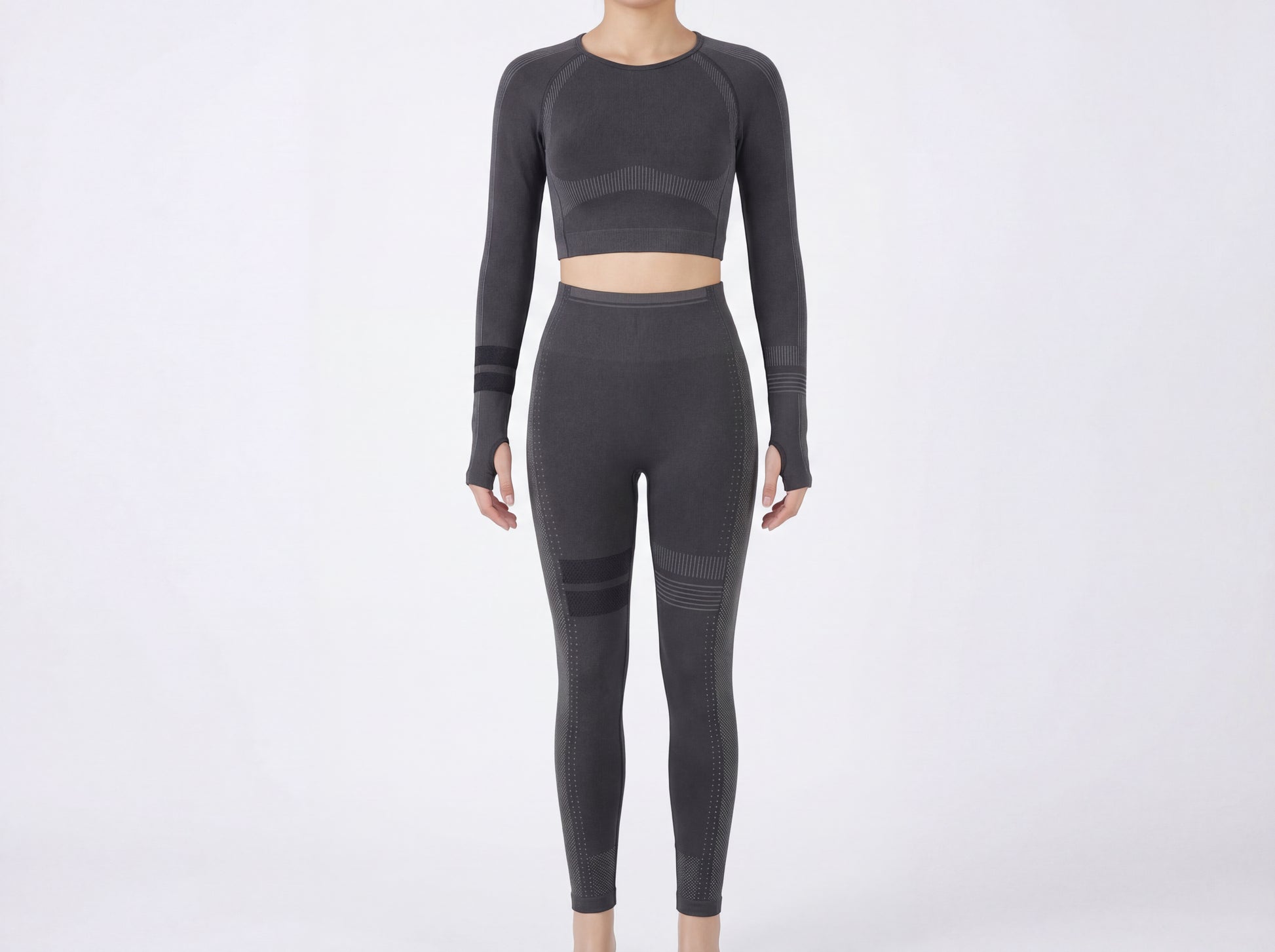 Presentation of the Shadow Flex Yoga Set by CHARMING BUNNY, showcasing a stylish black long-sleeve crop top paired with sleek high-waisted leggings, ideal for yoga and training. A fashionable choice for activewear ensembles. APPAREL, BASICS & ACTIVEWEAR, Black, CCPRODUCTS, NEW ARRIVALS, SETS.