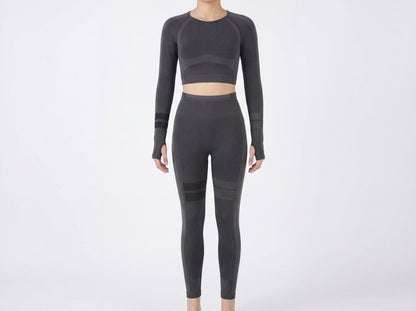 Presentation of the Shadow Flex Yoga Set by CHARMING BUNNY, showcasing a stylish black long-sleeve crop top paired with sleek high-waisted leggings, ideal for yoga and training. A fashionable choice for activewear ensembles. APPAREL, BASICS & ACTIVEWEAR, Black, CCPRODUCTS, NEW ARRIVALS, SETS.