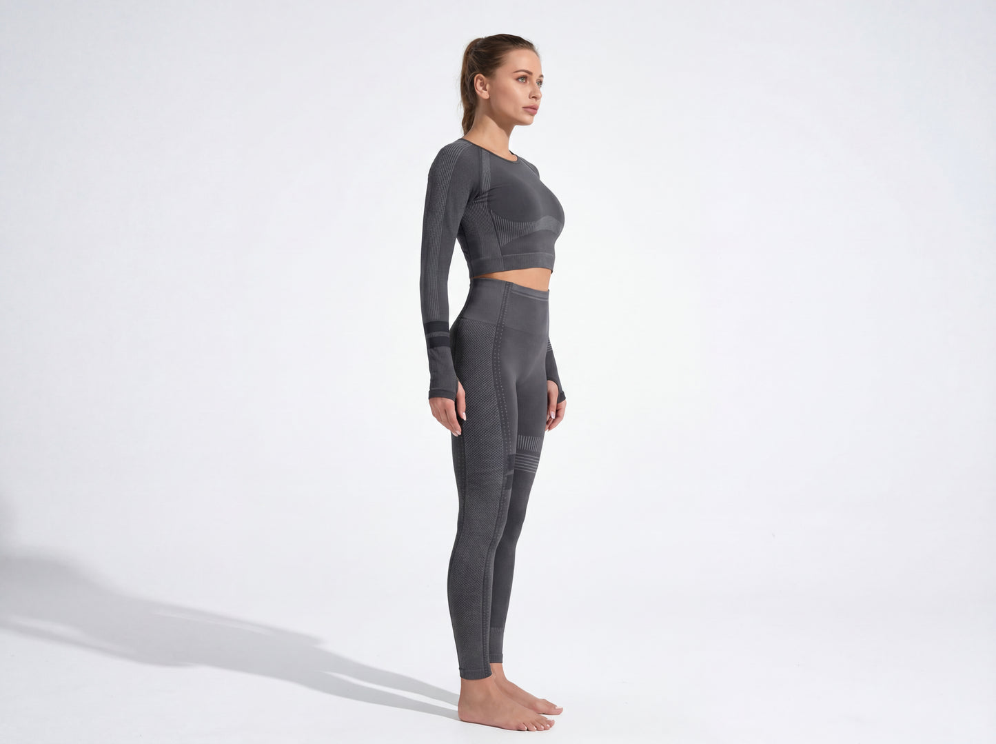 Product details of the Shadow Flex Yoga Set by CHARMING BUNNY, featuring a cropped long-sleeve top and high-waisted leggings in black, crafted for performance and style in activewear. Ideal for all-day use and workouts. APPAREL, BASICS & ACTIVEWEAR, Black, CCPRODUCTS, NEW ARRIVALS, SETS.