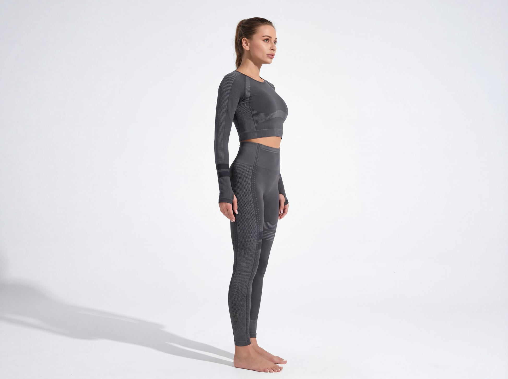 Product details of the Shadow Flex Yoga Set by CHARMING BUNNY, featuring a cropped long-sleeve top and high-waisted leggings in black, crafted for performance and style in activewear. Ideal for all-day use and workouts. APPAREL, BASICS & ACTIVEWEAR, Black, CCPRODUCTS, NEW ARRIVALS, SETS.