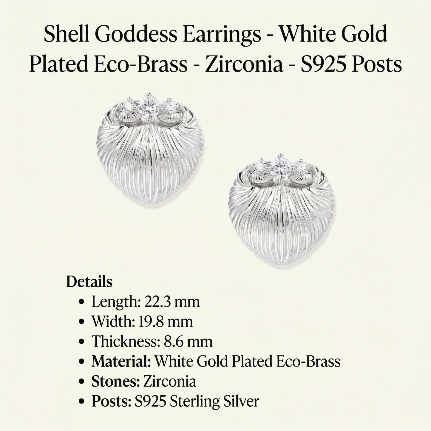 Detailed view of Shell Goddess Earrings by Astral Signature, highlighting their white gold plated eco-brass material and sparkling zirconia stones. This premium jewelry piece features S925 posts, making them a luxurious choice for any occasion.