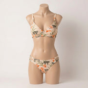 Display of the Plunge Bikini Set – Wild Garden Flora by Stylish Swimwear on a mannequin, showcasing its elegant design and premium fabric ideal for fashionable swimwear, suitable for resort wear. APPAREL, CCPRODUCTS, Multi, NEW ARRIVALS, SWIMWEAR & COVER-UPS.