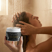 User applying Deep Cleanse Scalp Exfoliator from Astral Signature in the shower. Designed for all skin types, this treatment effectively removes buildup and promotes scalp health while featuring active ingredients like Rosemary Oil and Keratin. An essential hair-care product addressing lack of glow and volume.