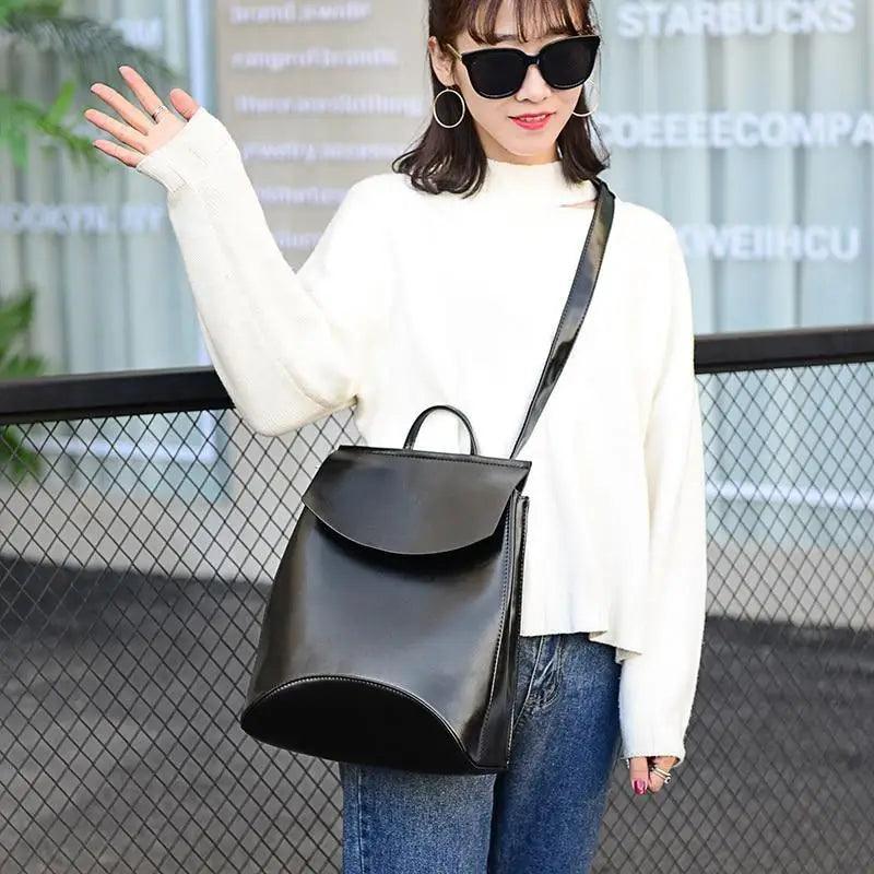 The Urban Guard Backpack in pristine white from Stevvex, showcasing its minimalist yet functional design for daily life. Available at Shopify Collective.