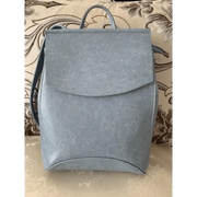 A luxurious gold Urban Guard Backpack by Stevvex, ideal for making a fashion statement while carrying essentials. Shop at Shopify Collective.