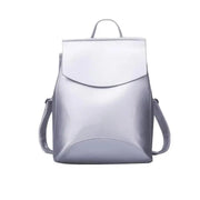 A shiny silver Urban Guard Backpack by Stevvex, appealing for its contemporary design and spacious capacity. Discover it at Shopify Collective.