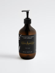 Astral Signature Hand & Body Wash, Ginger & Smoky Cardamom in an amber bottle, suitable for all skin types. This vegan formula features natural certified ingredients, hydrating betaine, and is allergen label free, gentle to skin, gluten-free, and nut-free. Perfect for cleansing and ideal for those with dehydrated skin.