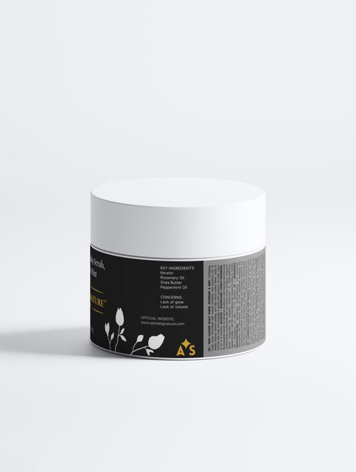 Back view of Deep Cleanse Scalp Exfoliator by Astral Signature. The product emphasizes key active ingredients like Rosemary Oil and Keratin, suitable for all skin types. This scalp exfoliator targets buildup removal and concerns related to lack of glow and volume, packaged in elegant white.