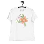 Casual scene with a model wearing the Women’s Relaxed Tee - Astral Spring T-Shirt from Astral Signature, emphasizing its elegant floral design. A perfect gift for her, this limited edition piece fits well in women’s style.