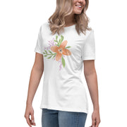 Model wearing the Women’s Relaxed Tee - Astral Spring T-Shirt by Astral Signature, smiling in a casual setting. This limited edition shirt makes a wonderful gift for her, adding to women's clothing collections.